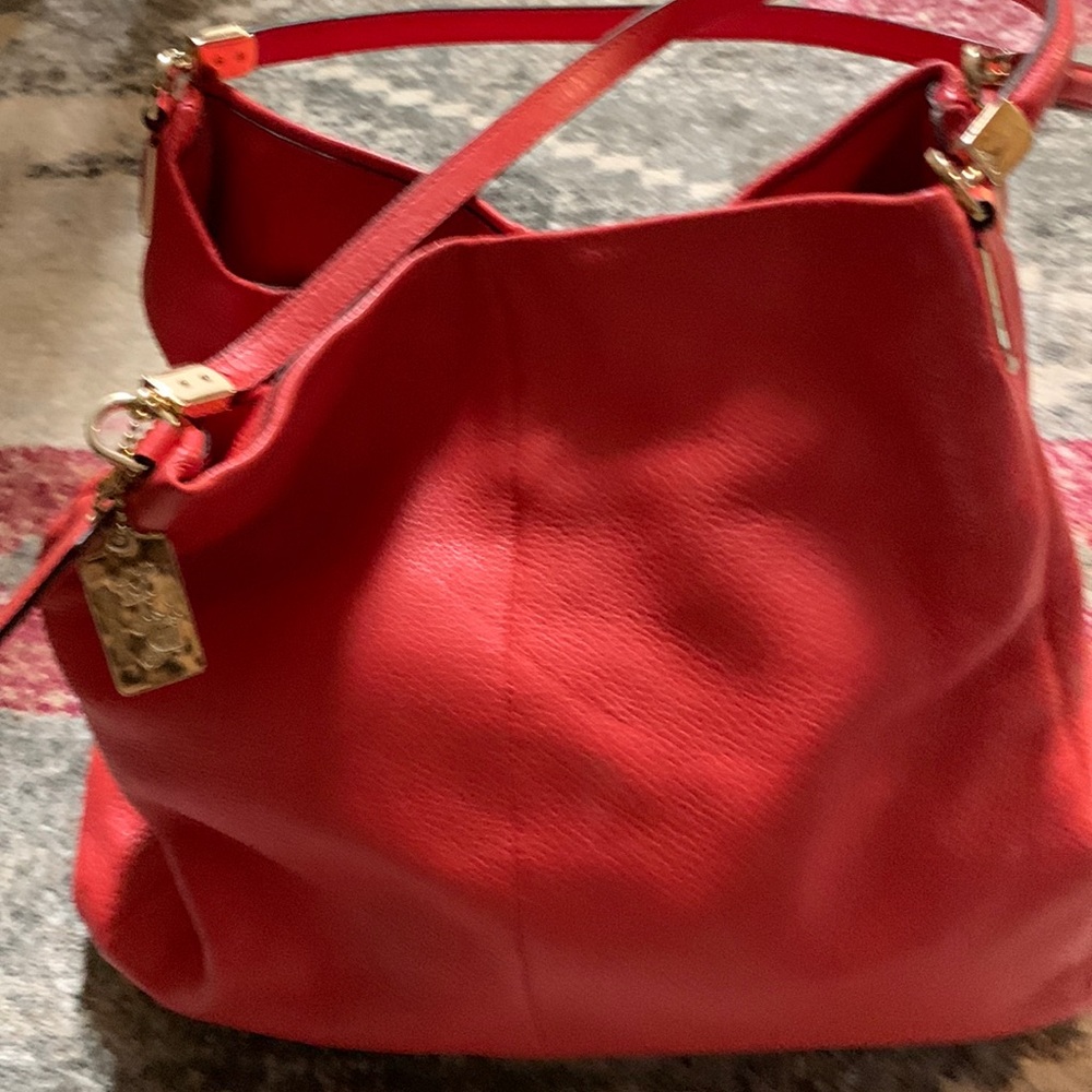 A red Coach bag